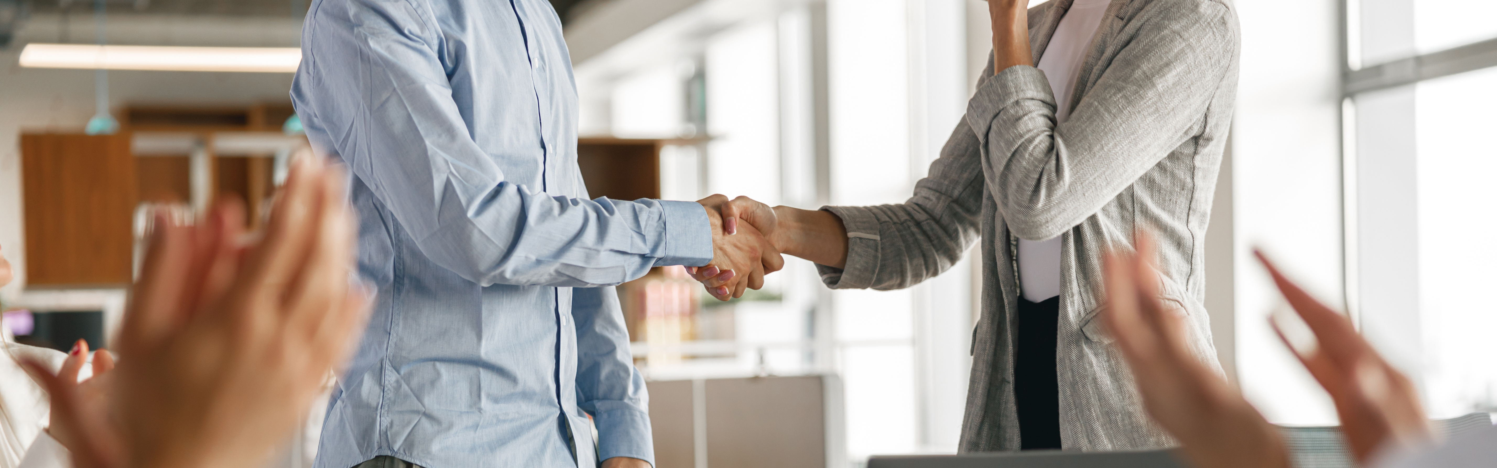 Shaking hands at new job