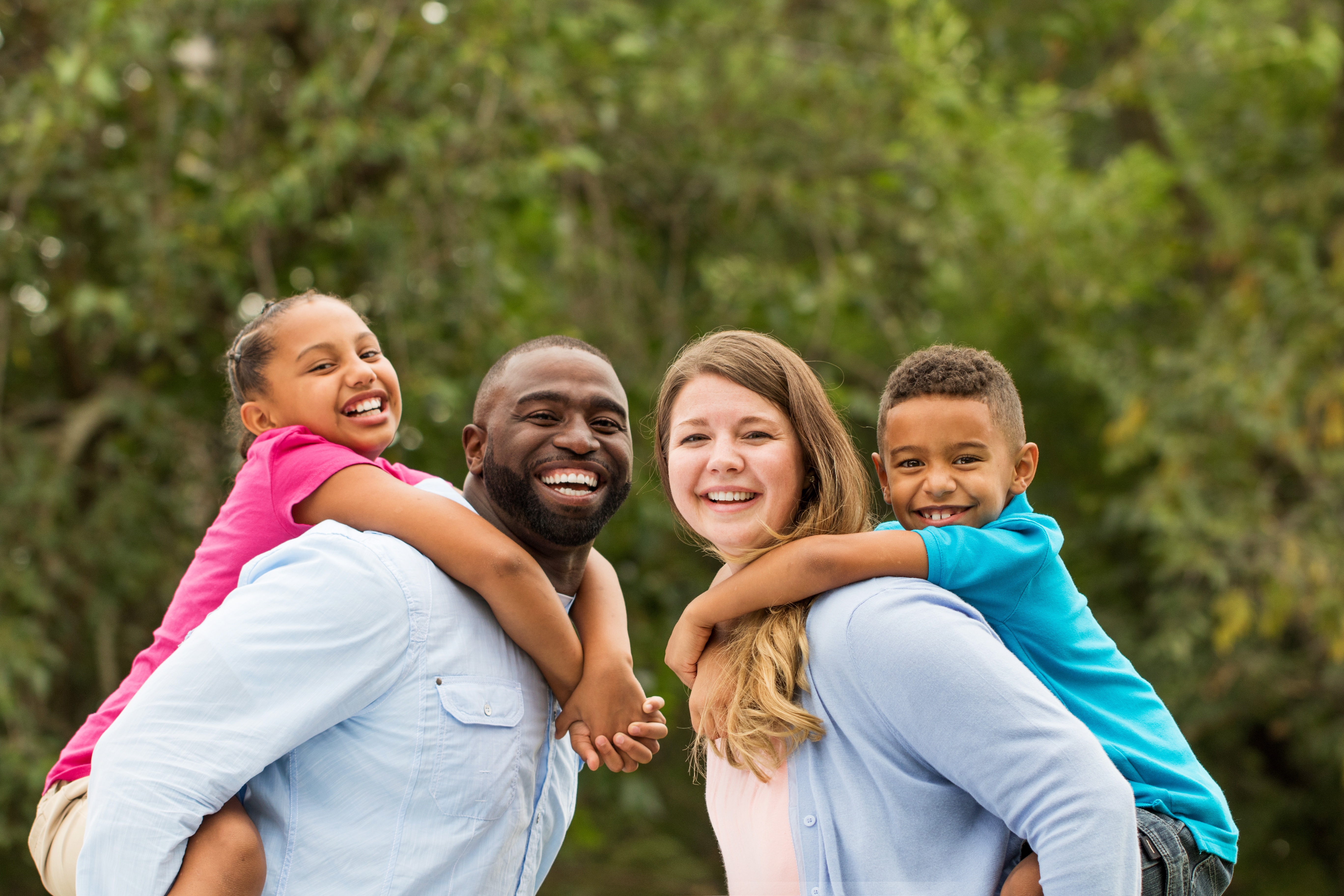 Family of four outdoors
