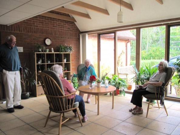 Residents in a communal area at Gracey Court