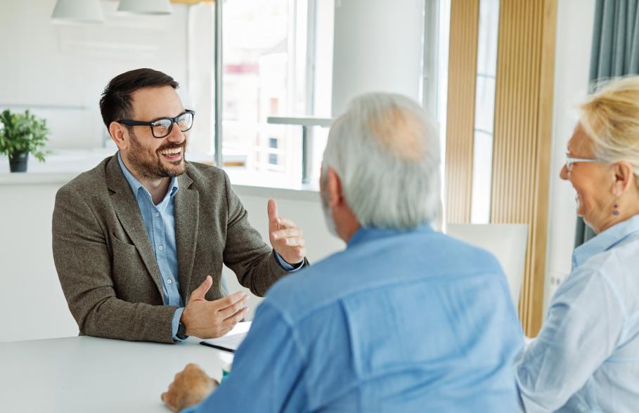 An advisor talks with a retired couple