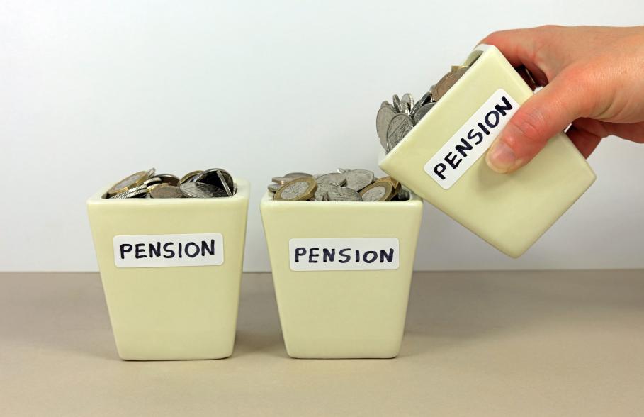 A row of three pots with money and the words Pension on them