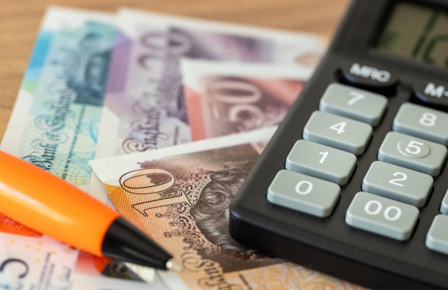 Bank Notes, Calculator and Pen