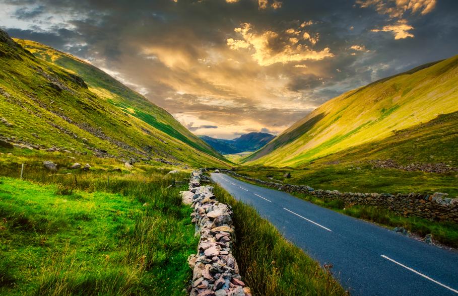 Sun sets over a valley in the Lake District