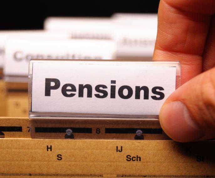 A filing cabinet folder with the word Pension