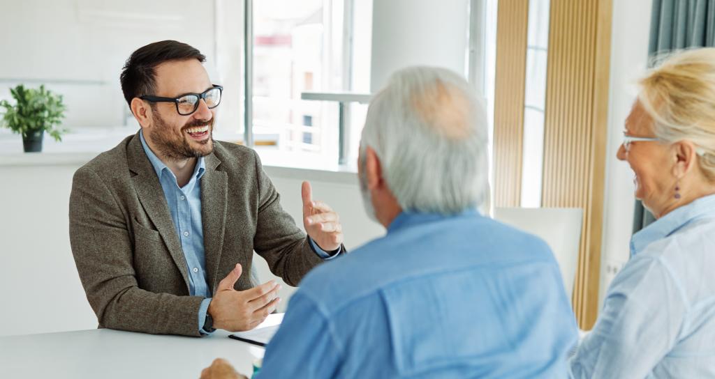 An advisor talks with a retired couple